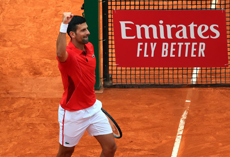 Serbia's Novak Djokovic celebrates winning his round of 32 match against Russia's Roman Safiullin. Picture: REUTERS/Denis Balibouse