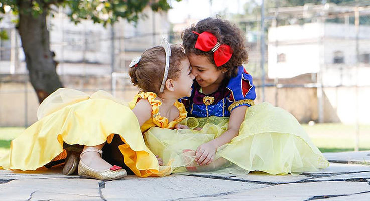 Children in Disney princess outfits