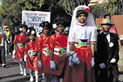 COLOURFUL: Paraguay tasted South Africa's multicultural music when these school pupils showed their dancing talents. Pic. Thuli Dlamini. 06/06/2010. © Sowetan.