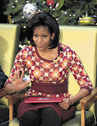 LISTEN UP: US first lady Michelle Obama gestures before a book reading at the Children's National Medical Centre in Washington last month Picture: YURI GRIPAS/GALLO IMAGES