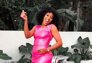 An unidentified woman allegedly stole Sbahle Mpisane's weave hair piece at the scene of her car accident.