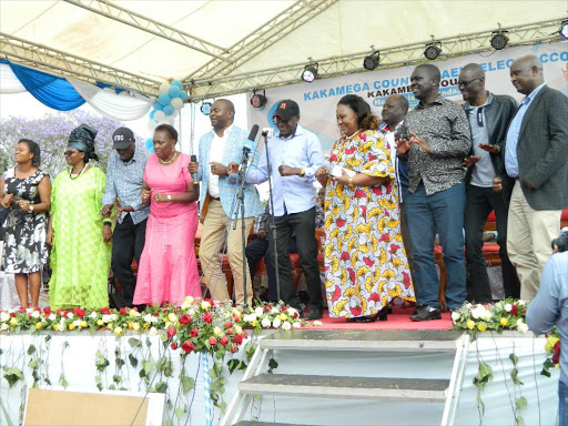 CS Rashid Echesa with Western MPs and women reps during a fundraiser on Saturday. /CALISTUS LUCHETU