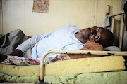 November 11, 2016. Lesotho national,  Phillip   Phamotse , who suffers from TB, lies in his bed at the Circle Labour Hostel in Rustenburg, North West. Pic: Thulani Mbele