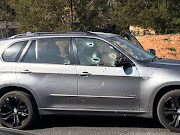 A BMW X5, riddled with bullet holes, after what appears to have been an organised hit on July 17, 2018 in Randburg.