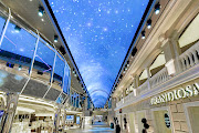 The Grandiosa's  112m-long indoor promenade boasts a 93m domed LED screen - the longest sky screen at sea. The images it features, in this picture a night sky, change frequently.    