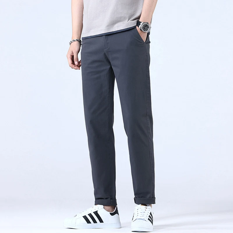 Męskie spodnie slim fit straight trend z elastycznym materiałem. Wygoda i modny styl dla nowoczesnego mężczyzny, idealne na każdą okazję.