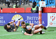 James Murphy of South Africa goes over for a try in the HSBC Canada Sevens fifth-place playoff against New Zealand at BC Place in Vancouver on April 17 2022.