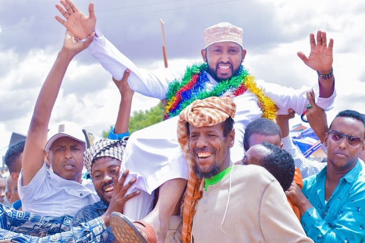 Wajir governor aspirant Siyad Abdullahi is carried shoulder high by members from the Mataan sub clan of Degodia when they endorsed him on Tuesday, May 17.