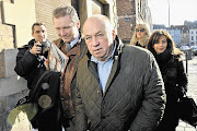 DATE WITH THE DOCK: Belgian Dominique Alderweireld, foreground, is one of the 14 defendants in the so-called 'Carlton Case' trial in Lille, France. One of his co-defendants is former IMF chief Dominique Strauss-Kahn, who is accused of being part of a prostitution ring four years after a sex scandal cost him his career