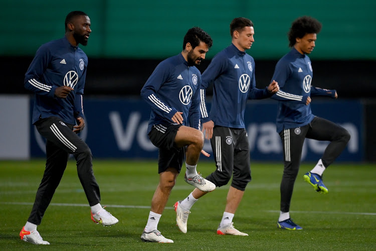 Antonio Rüdiger, Ilkay Gündogan, Julian Draxler and Leroy Sane of Germany are seen during a training session at training ground D on November 09, 2021 in Wolfsburg, Germany.