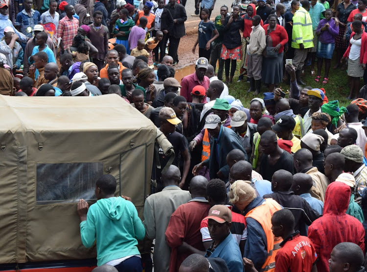 Police and residents at the scene on January 1, 2023.