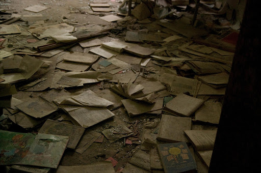 Ruined school books. File photo.