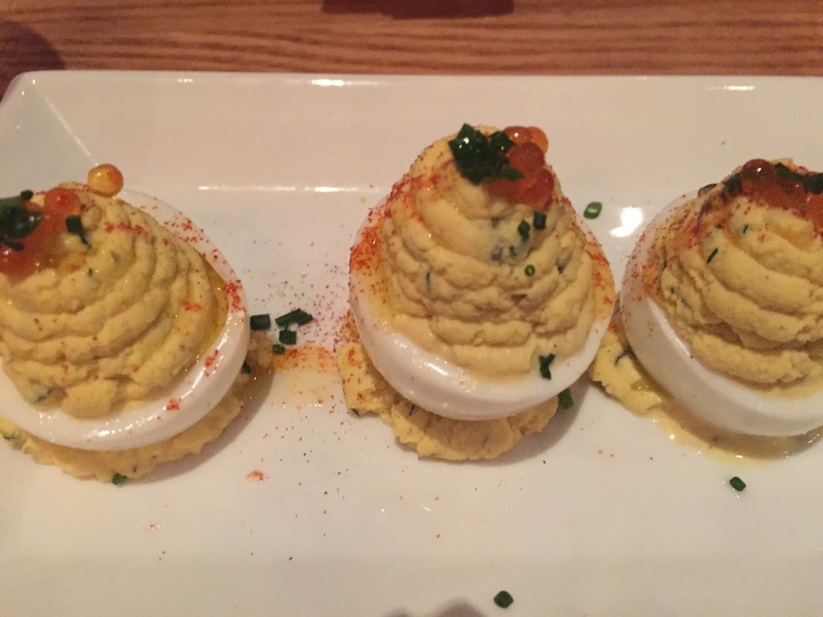 Deviled eggs topped with caviar