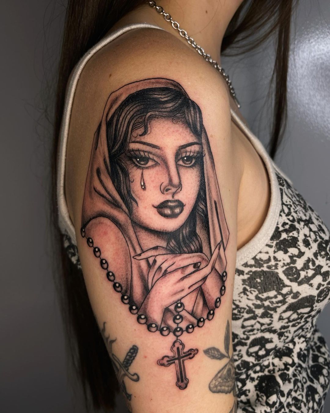 virgin mary rosary tattoo