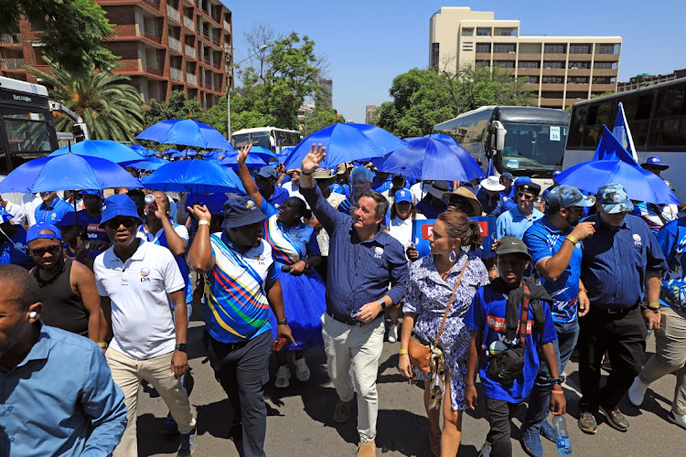 DA John Steenhuisen and party supporters walk through the streets of Pretoria on their way to the Union Buildings.