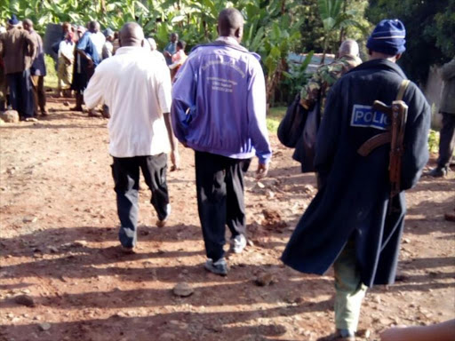 Neighbors and police officers arriving in Bishop Muiru's family home.Photo/File