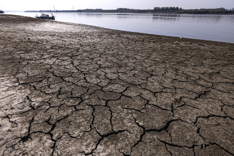 Cracked silt on the bank of the low Yangtze River in Wuhan, China, August 19 2022. Picture: GETTY IMAGES