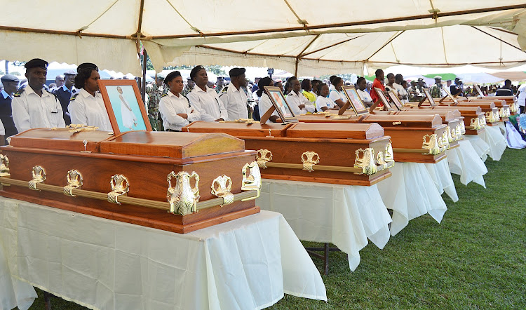 Caskets bearing the bodies of 13 pupils who perished in Kakamega Primary School tragedy during a memorial service at Bukhungu Stadium Kakamega county on Friday. A muslim girl had been buried earlier.