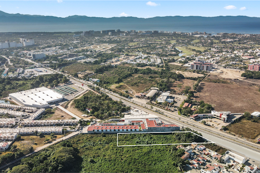 Aerial view of residential and commercial area - Luxury land for sale in Mezcales