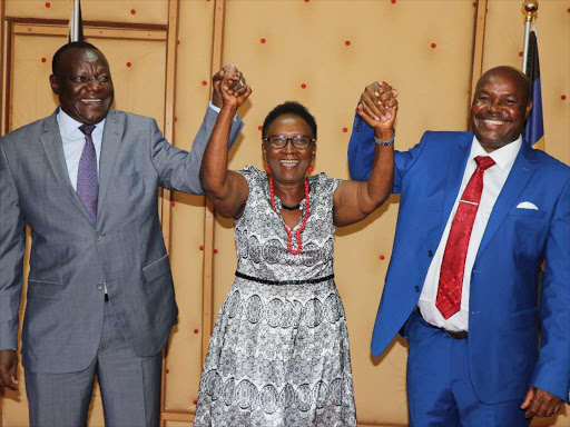 Machakos Deputy Governor Francis Maliti, Makueni Deputy Governor Adelina Mwau and Kitui Deputy Governor Julius Wathe in show of unity at Machakos today. Pix Andrew Mbuva.