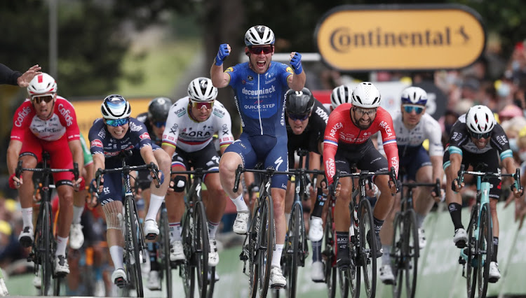 Mark Cavendish of Britain celebrates winning stage four of the Tour de France in France, June 29 2021. Picture: REUTERS/GUILLAUME HORCAJUELO