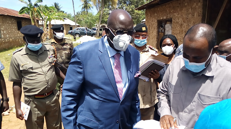 Education CS George Magoha on a door-to-door 100% education transition hunt in Kwale on Monday, August 23.