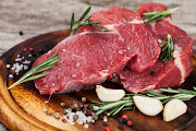 Raw beef meat on a cutting board