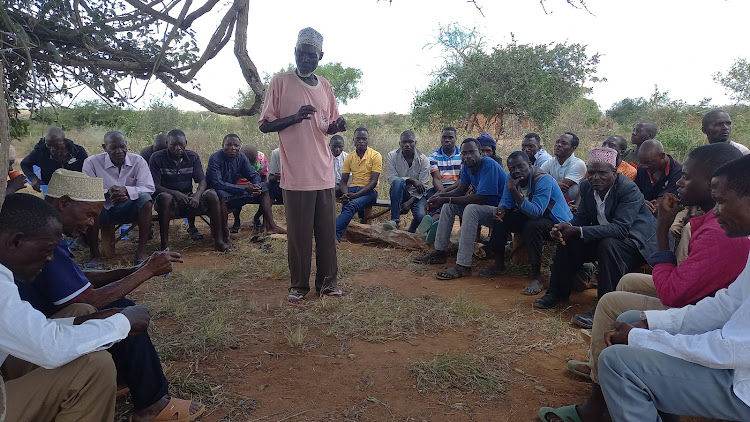 Residents hold a meeting to discuss land issues in Kanjaocha town, Samburu, in Kwale county on Wednesday, May 8, 2024.