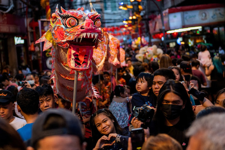 A dragon dance group performs in Manila, the Philippines, January 22 2023. Picture: LISA MARIE DAVID/REUTERS