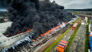 Drone footage - commissioned by TMG Digital - has revealed the full extent of the Durban factory fire, which continued to burn on Saturday afternoon.