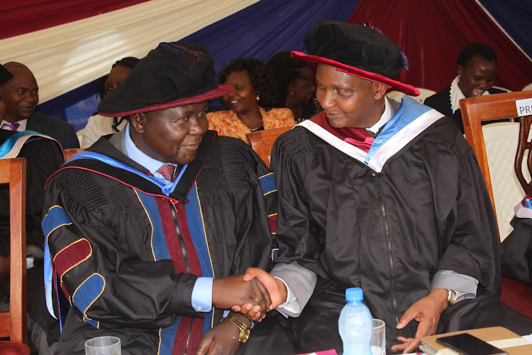 Acting director general Ministry of Health Wekesa Masasabi with Outspan Hospital and Outspan Medical College executive director Macharia Kiruhi.