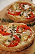 Puff Pastry Pizzette was pinched from <a href="http://12tomatoes.com/2014/11/easy-pizza-recipe-garlic-tomato-and-herb-puff-pastry-pizzette.html" target="_blank">12tomatoes.com.</a>