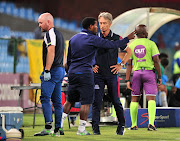 Maritzburg United coach Mushin Ertugral (R) chats to his assistant Mabhuti Khenyeza during the Absa Premiership match at Loftus Versveld on January 16 2019. 