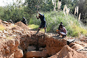 Helping themselves: Zama zamas digging at the abandoned Mintails mines in Krugersdorp. 