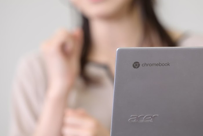lady working on a chromebook