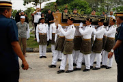 Malaysia Army personnel carry the coffin of Dora Sheila Kassim, one of the victim of MH17 in the Bukit Kiara cemetery. Picture Credit: Getty Images