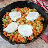 Thumbnail For A Cast Iron Skillet With Sweet Potato Hash And Over-easy Eggs.