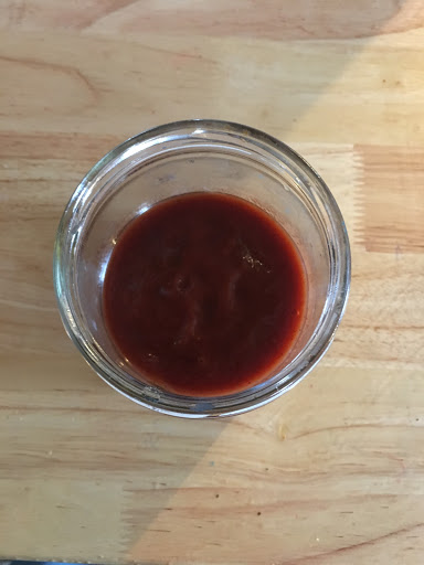 Sweet and Smoky BBQ sauce in a mason jar waiting for use.