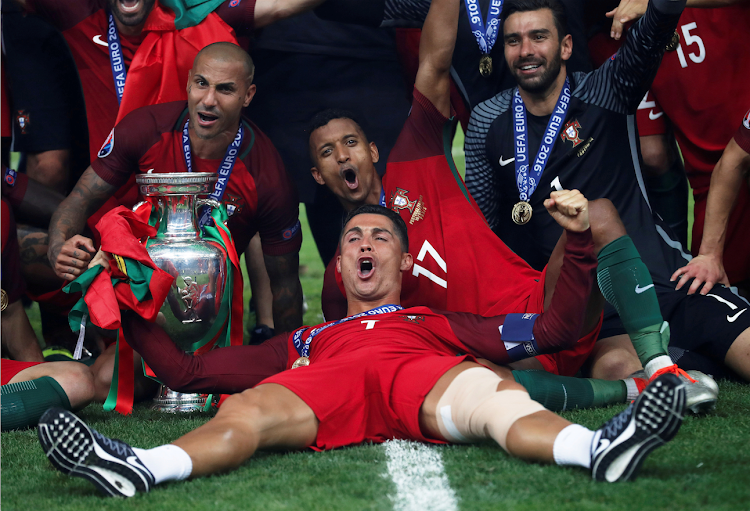 Portugal's Ricardo Quaresma celebrates with Nani, Cristiano Ronaldo and Rui Patricio after winning the Euro 2016 championships