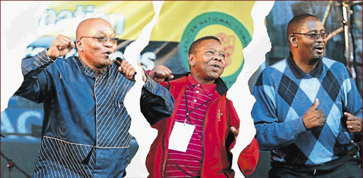 GETTING IN TUNE: At the June 16 commemoration gathering at Absa Stadium in 2006 from left the then ANC deputy president Jacob Zuma, SACP general secretary Blade Nzimande and the then general secretary of Cosatu Zwelinzima Vavi dancing to trademark anti-apartheid struggle song ‘uMshini wami’ Picture: THEMBINKOSI DWAYISA