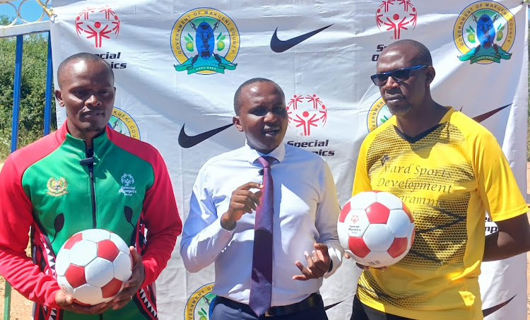 Sports Manager, Special Olympics Kenya Vincent Mungai, Makueni Sports County Executive Eng. Peter Mumo and County Sports Director Ambrose Kisoi during a press briefing on Thursday ata Wote, Makueni