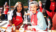 DJ Zinhle and Pearl Thusi at an event