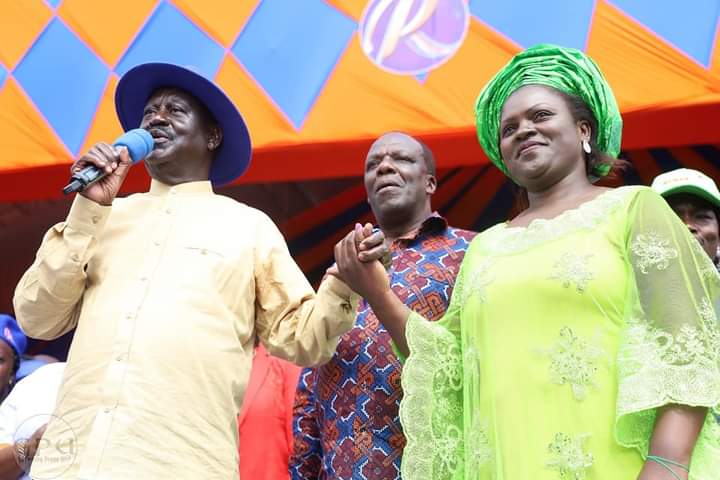 ODM leader Raila Odinga welcomes Jackeline Okanya to Azimio la Umoja at Bukhungu Stadium on Wednesday, August 3, 2022.
