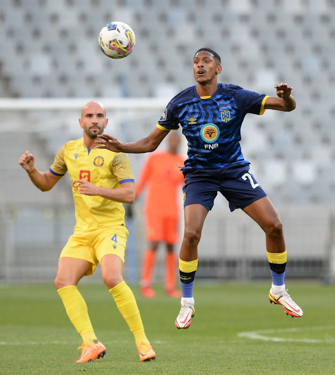 Taahir Goedeman of Cape Town City controls the ball ahead of William Silva of Petro de Luanda during a CAF Champions League 2022/23 game at Cape Town Stadium on October 8.