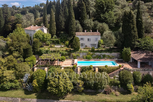 White villa with pool and landscaped garden in this luxury house for sale in Grasse ($4,580,666 - 521 m²)