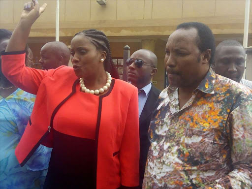 Thika Town MP Alice Ng'ang'a with Kabete MP Ferdinand Waititu at Milimani court on Friday Photo/Carole Maina