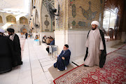 A Pakistani Muhammad Azzam saqi walks inside the shrine of Imam Ali ,on the first time of religious school called (al-Hawza al-Ilmiyyah) reopening since the the coronavirus disease (Covid-19) outbreak, ,in the holy city of Najaf, Iraq November 10, 2021. 