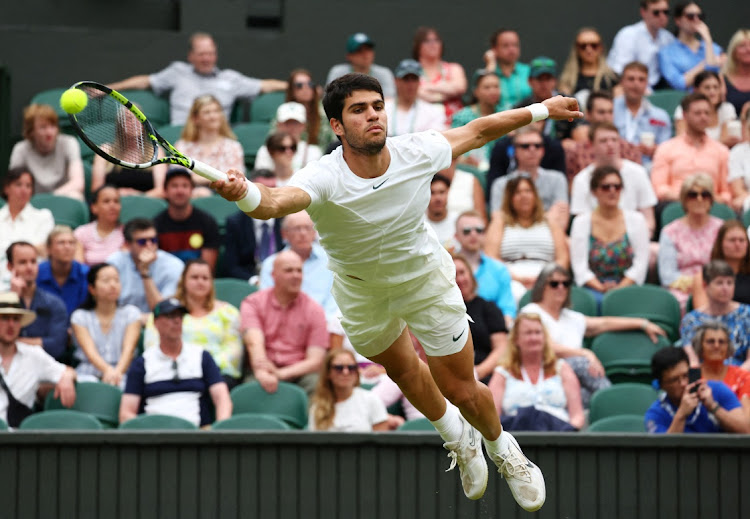 Spain's Carlos Alcaraz in action during his third round match against Chile's Nicolas Jarry at the Wimbledon Championships at the All England Lawn Tennis and Croquet Club in London on July 8 2023.