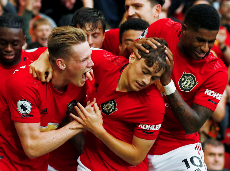 Manchester United's Daniel James celebrates scoring their fourth goal with Scott McTominay, Marcus Rashford and team mates