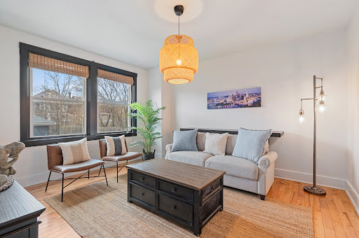 Living room with sofa, coffee table, armchairs - Luxury house for sale in Regent Square, 3 bedrooms